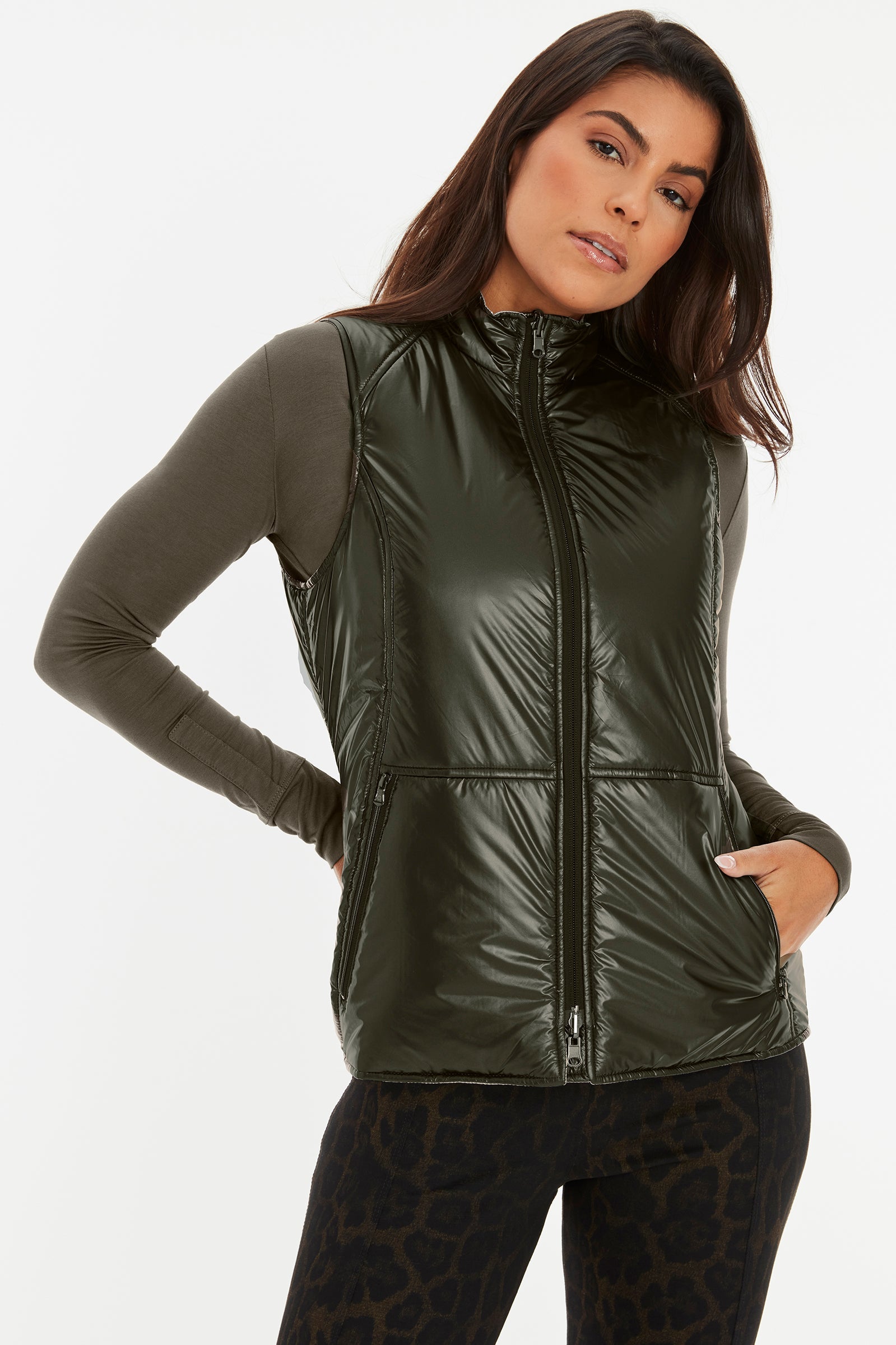 army-green-black||||2021_09_16_March_Catalog_Editorial_Vertical_PDP_Cheetah_Kenya_and_Aida_Suit.mp4